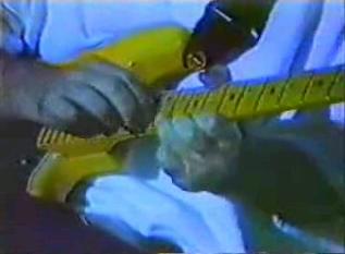 Zappa playing guitar